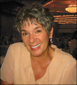 Susan signs books
